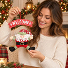 Santa Welcome Door Hanger — Held by a model