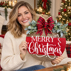 Merry Christmas Wooden Door Sign — Held by a model