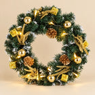 Lighted Gold Gift Wreath — Beige studio