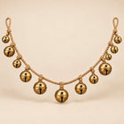 Antique Gold Jingle Bell Garland — Beige studio